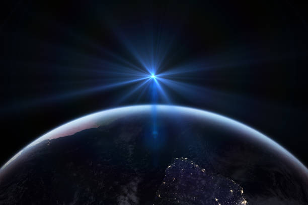 istock Sunrise in space with earth, solar energy concept. 980714148