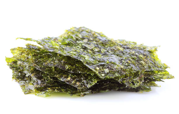 istock Crispy dried seaweed nori isolated. 980714564