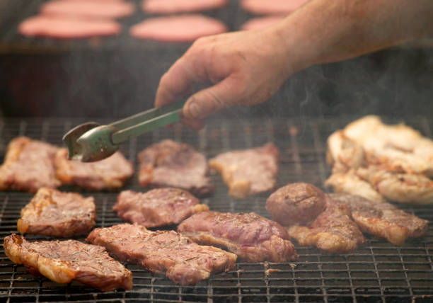 istock CHICKEN AND BEEF STEAKS ON BARBECUE 980720138