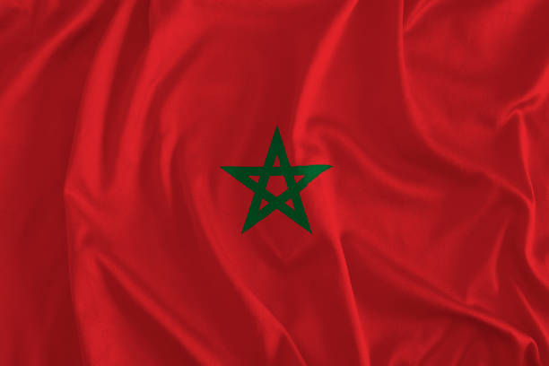 flagge von marokko hintergrund - moroccan flags stock-fotos und bilder