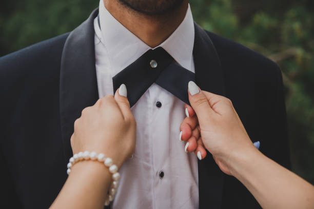 istock Groom at wedding tuxedo in the forest 980737552