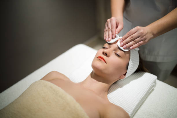 istock Facial massage treatment by professional 980750068