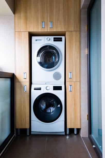 istock Washing machine in modern apartment 980755344