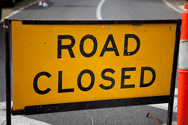 Road Closed Sign  road closed sign horizontal road nobody stock pictures, royalty-free photos & images