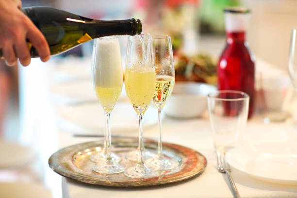 istock Champagne glasses and bottle in restaurant 980796710