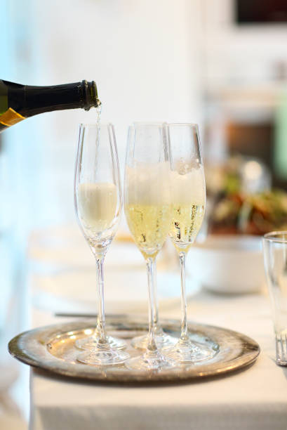 istock Champagne glasses and bottle in restaurant 980796754