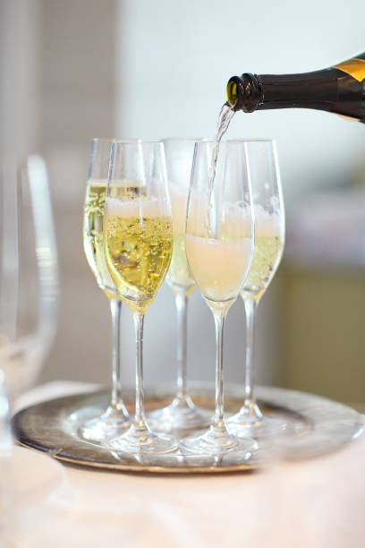 istock Champagne glasses and bottle in restaurant 980796798