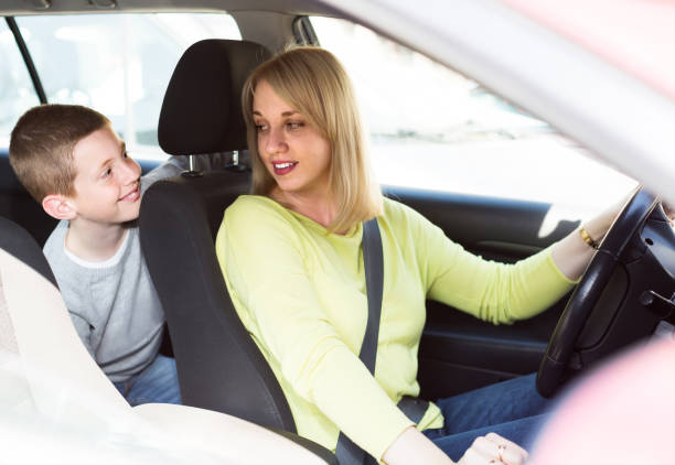 istock mother and son taking car ride during sightseeing tour 980796942