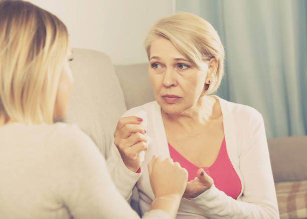 istock daughter comforts a sad mother 980798358