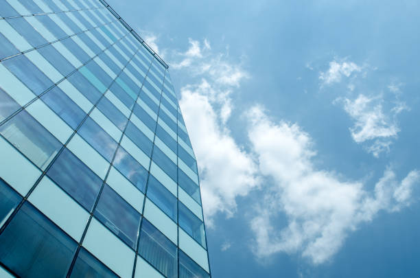 istock Blue glass wall of skycrapper. Urban abstract background 980807904