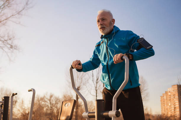 istock Senior man workout in outdoor gym 980808308