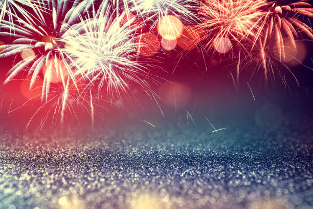 istock 4th July fireworks with glitter sparkle Abstract background 980813556