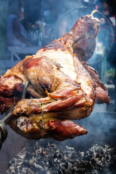 istock Lamb is fried on a spit in the smoke over hot coals 980818436