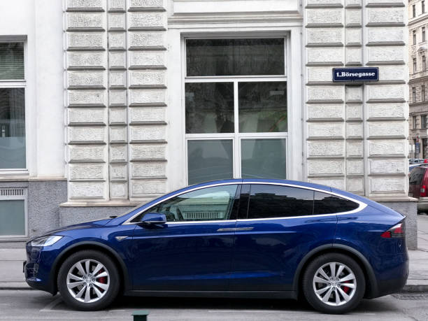 Tesla Model X Vienna, Austria - December 17, 2016: Blue Tesla Model X parked on a street in Vienna, Austria tesla model x stock pictures, royalty-free photos & images