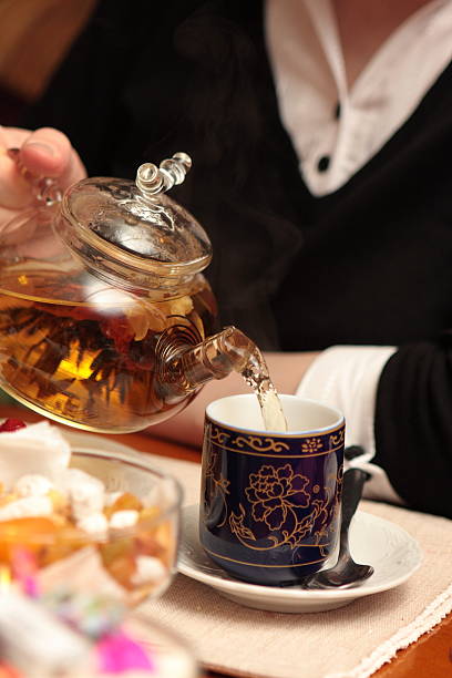 istock Woman pouring the tea 98083964