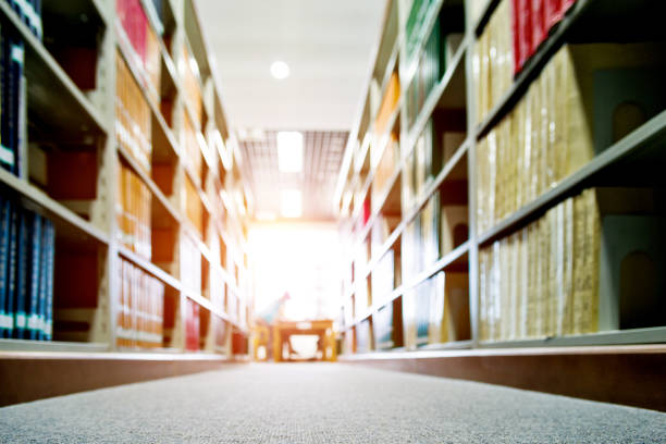 Many hardcover books in bookshelf