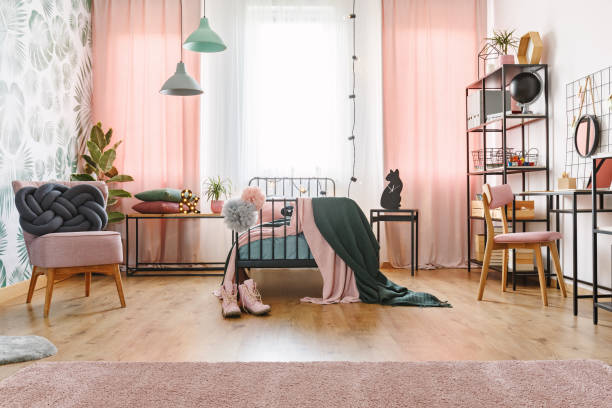 istock Pink and green pastel bedroom 980851526