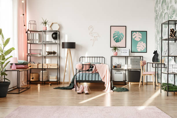 istock Posters in pastel bedroom interior 980851532