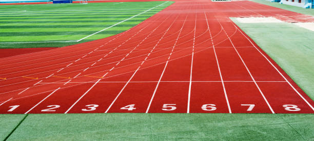 istock Start running track in sport field 980851566