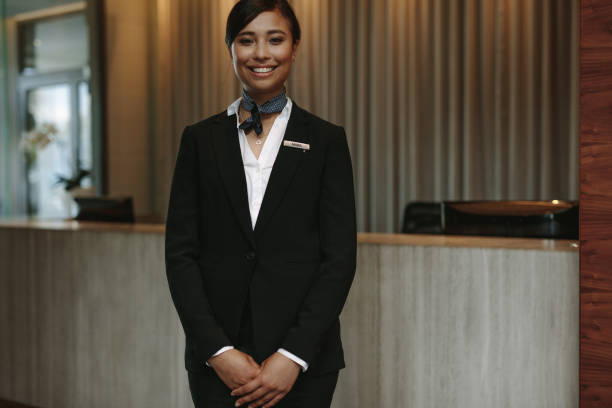 istock Female concierge ready to welcome guest 980856956