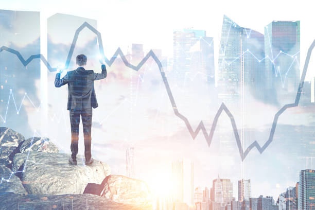 istock Businessman interacting with graph in a city, rock 980857340