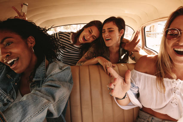 istock Girls having great time on road trip 980858168