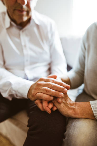 istock retirement couple holding hands 980858208