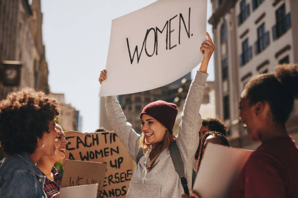 istock Females gathering on road for demonstrations 980871048