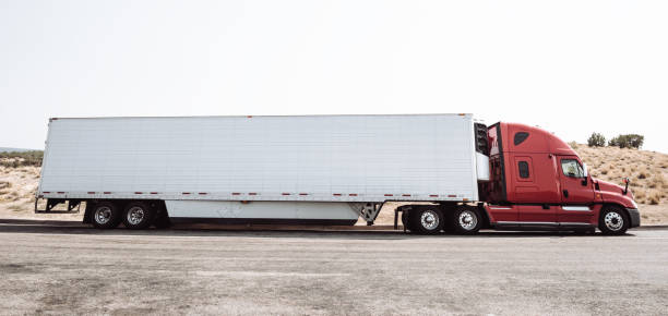 istock blank truck on the road 980877596