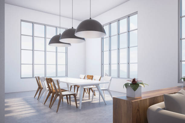 istock White dining room corner, white and wood chairs 980907226