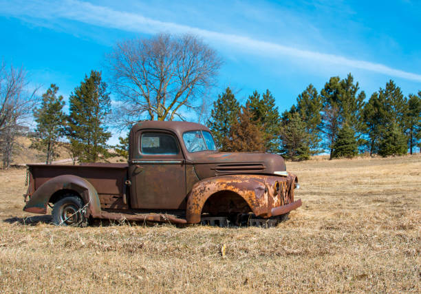 istock Old truck in a field 980926940