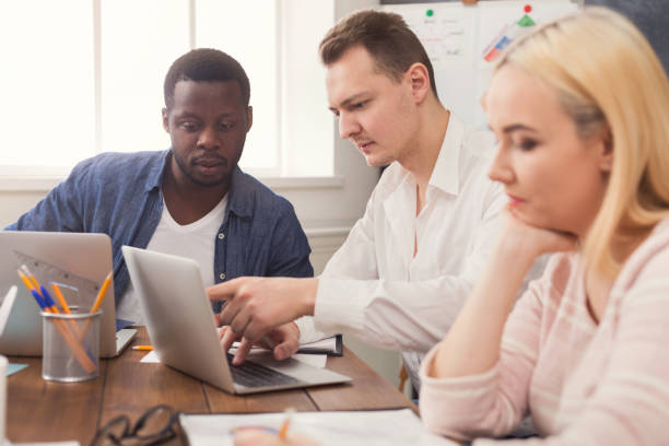istock Business meeting. Multiethnic team in office 980932462