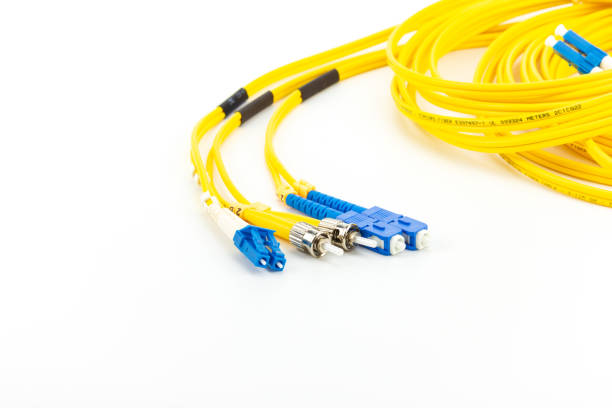 istock Single mode fiber optic cables patch cord with LC, SC and ST connector type 980935094
