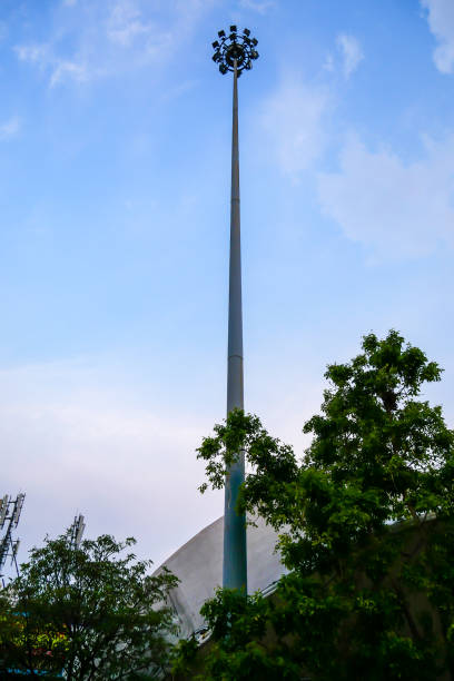 istock The tall Spotlight tower in the city. 980935532