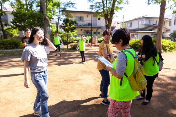 istock Group of volunteers getting ready to clean up pubic park 980937030