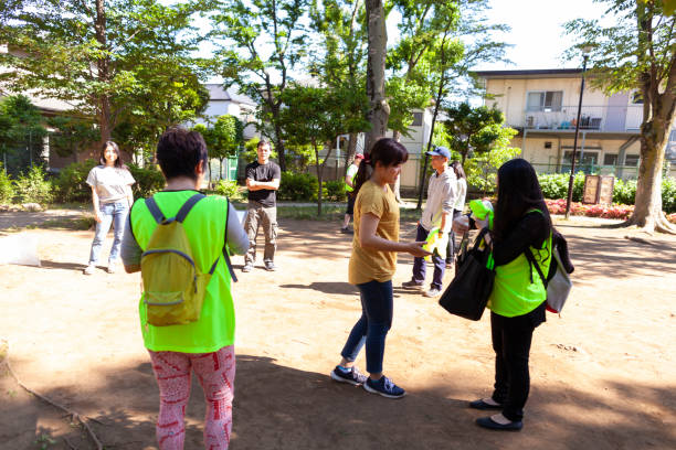 istock Group of volunteers getting ready to clean up pubic park 980937092