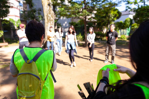 istock Group of volunteers getting ready to clean up pubic park 980937570