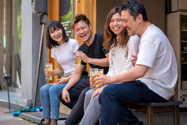 istock Group of friends drinking together 980937710