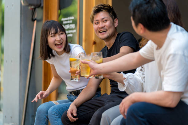 istock Group of friends drinking together 980937740
