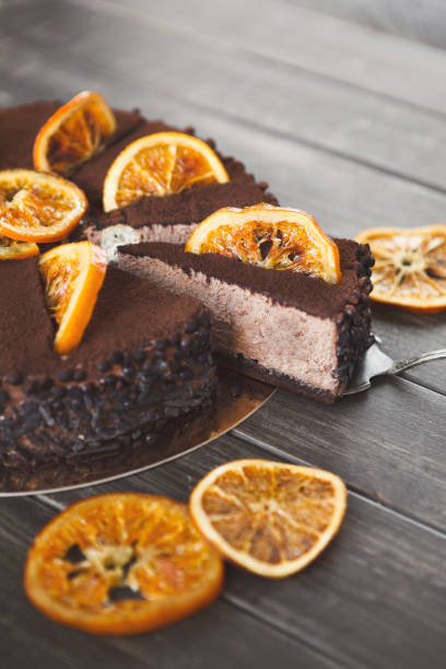 istock Chocolate cake with cream and profiterole 980952222