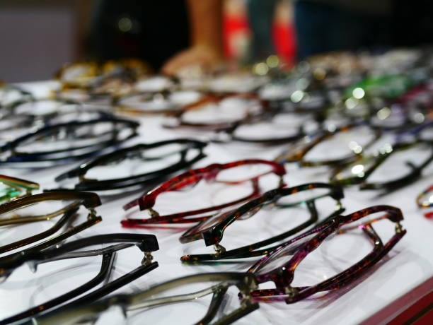 istock glasses on shelves in store 980952386