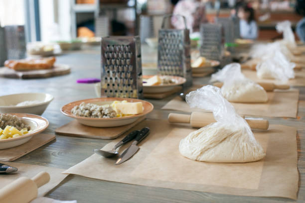 istock cooking class, culinary. food and people concept, desktop getting ready for work 980953036