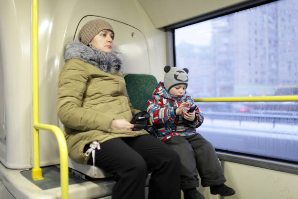 Portrait of mother with her son in the bus