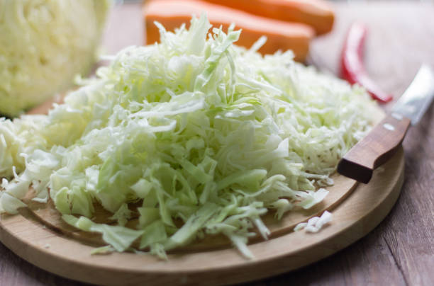 istock white cabbage cut into strips and carrots for cooking 980954560