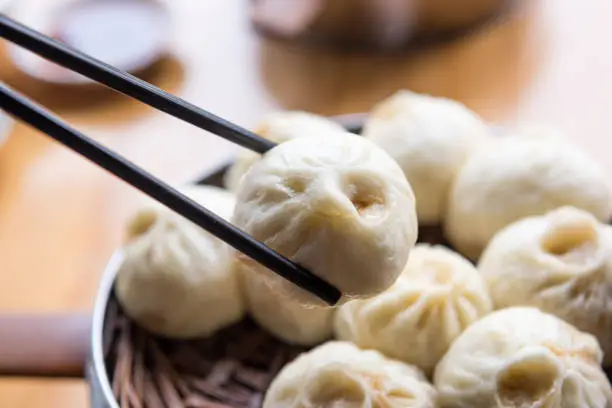Photo of Steamed Xiaolongbao with chopsticks