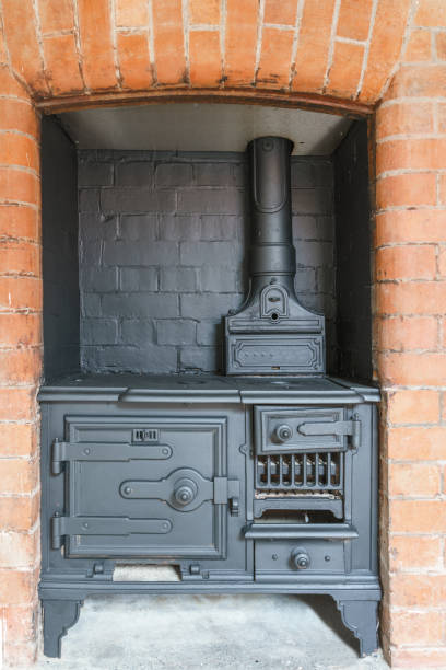 istock Iron fireplace in a living room 980963104