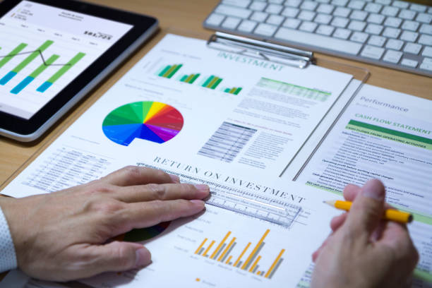 istock Reviewing a financial report in returning on investment analysis 980965322