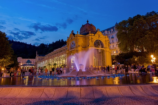 Singing Fountain in small Czech spa town Marianske Lazne (Marienbad) at night - Czech Republic
