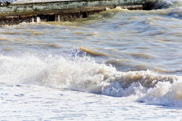 istock Sea foam waves in summer day 980976072