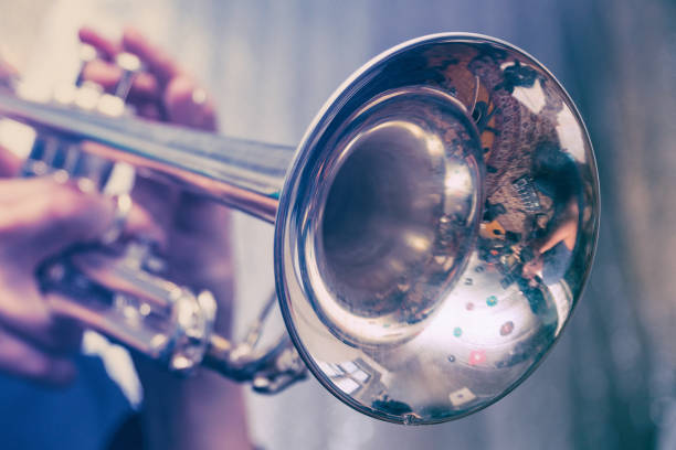 istock Trumpeter is playing on a silver trumpet 980981958